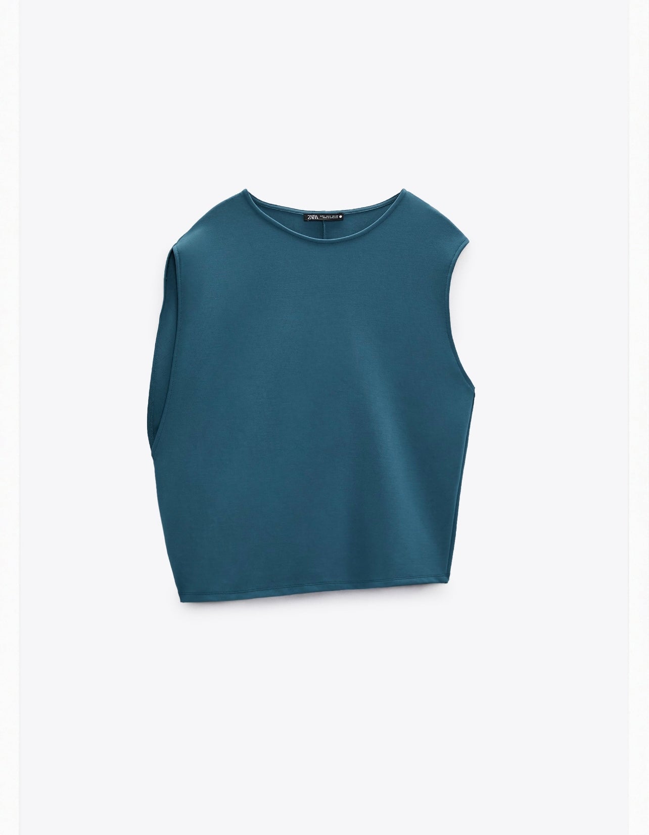 Blusa manga Asimétrica