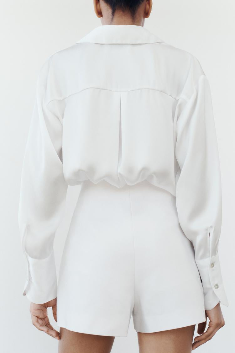 Blusa de seda blanca