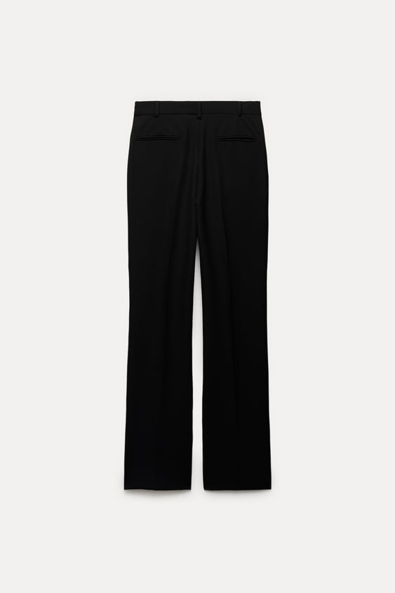 Pantalon negro con abertura